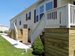 Millsboro, DE– After deck cleaning, rails were stained with solid stain, 2 coats