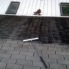 Dirty roof with heavy mildew in Lewes half cleaned by Deck Resurrect