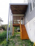 Elevated deck columns & screened-in porch stained– Greenbackville, VA (Facing Wallops Island)