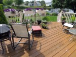 Deck with heavy stain needs cleaning and recoating, Oceanview, DE